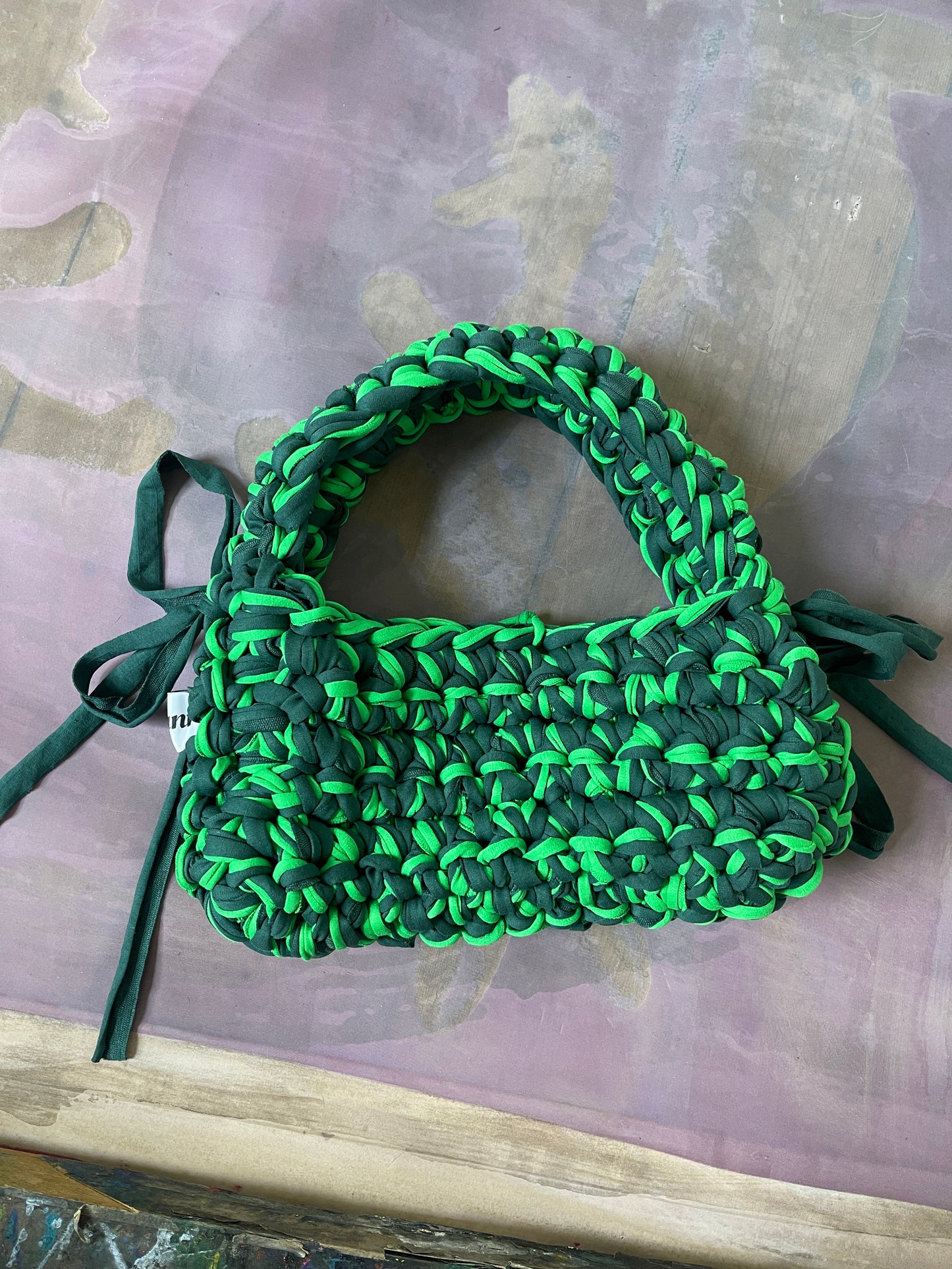Green and neon shoulder ribbon